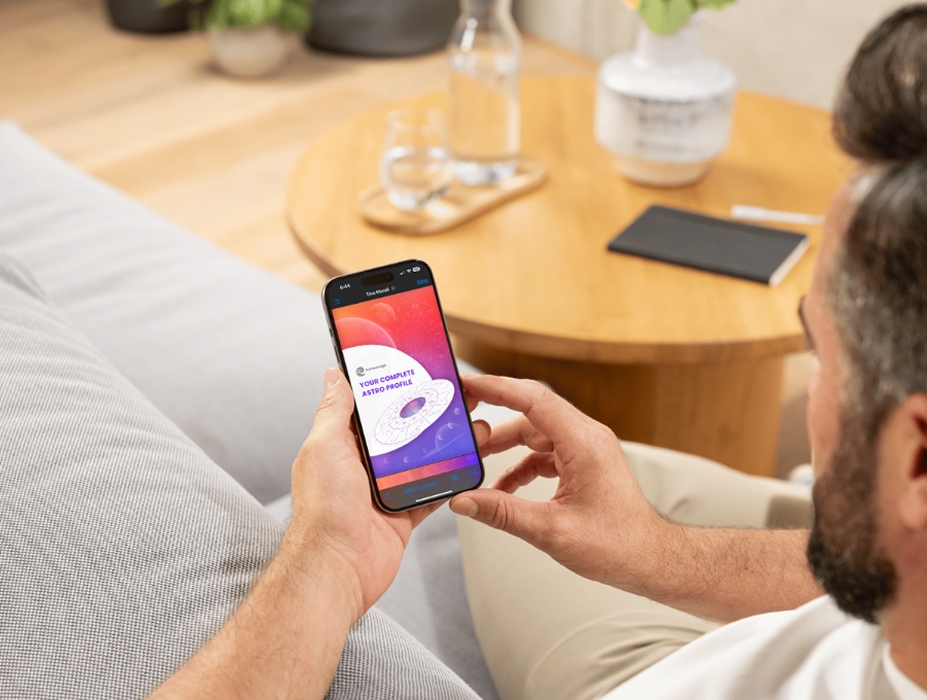 Person using AstroJudge app on phone